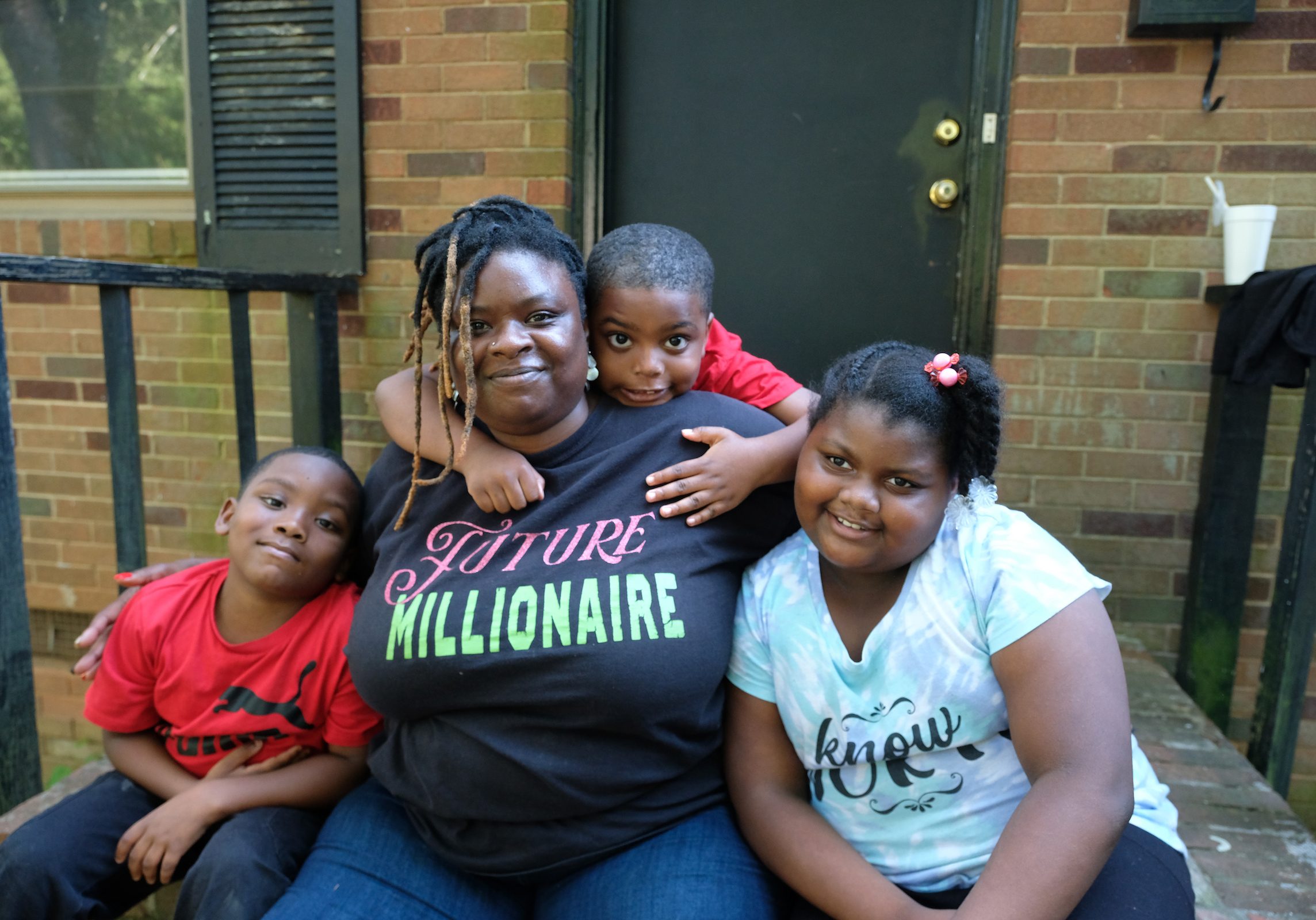 Crystal Robinson at home with her sons Nehemiah and Josiah, and her daughter Nevaeh.